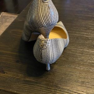 Ivanka Trump kitten heeled black and white pumps.